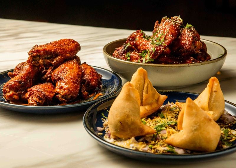 Samosas and Indian-inspired wings are on the menu at Tandoori Pizza and Wing Co. at Colony Square. / Courtesy of Tandoori Pizza  and Wing Co.