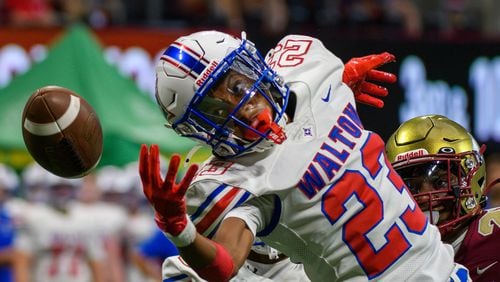 Walton’s MJ Burnett reaches for an interception against Brookwood in the second quarter during the Corky Kell Classic at Mercedes Benz Stadium in Atlanta, GA on August 17, 2024. (Jamie Spaar for the Atlanta Journal Constitution)