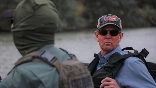 Brian Kemp surveys the Rio Grande River during an April 30, 2021 visit.