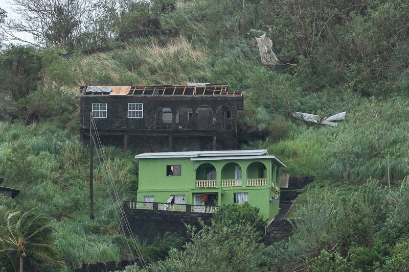 Houses damaged by Hurricane Beryl in Kingstown, Srt. Vincent and the Grenadines, Monday, July 1, 2024. (AP Photo/Lucanus Ollivierre)