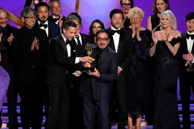 Justin Marks, left center, and Hiroyuki Sanada, center right, and the team from "Shogun" accepts the award for outstanding drama series during the 76th Primetime Emmy Awards on Sunday, Sept. 15, 2024, at the Peacock Theater in Los Angeles. (AP Photo/Chris Pizzello)