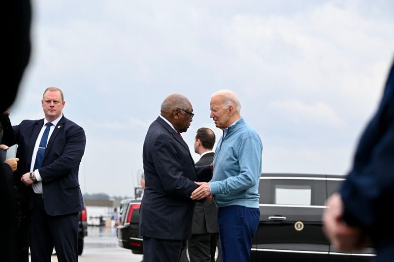 U.S. Rep. James Clyburn, left, greets President Joe Biden upon his arrival last week in Columbia, South Carolina. In 2020, the state's Democrats gave him an important win that led to his nomination. (Kenny Holston/The New York Times)
                      