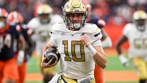 Georgia Tech quarterback Haynes King (10) runs for a touchdown during the first half of an NCAA football game against Syracuse, Saturday, Sept. 7, 2024 in Syracuse, N.Y. (AP Photo/Hans Pennink)