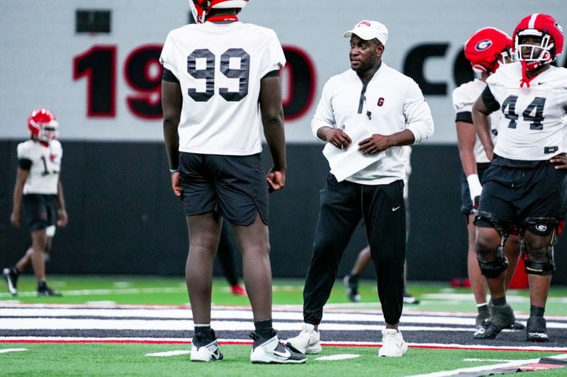 Georgia co-defensive coordinator and safeties coach Travaris Robinson oversees a defensive drill during the Bulldogs' spring practice session March 12 in Athens.