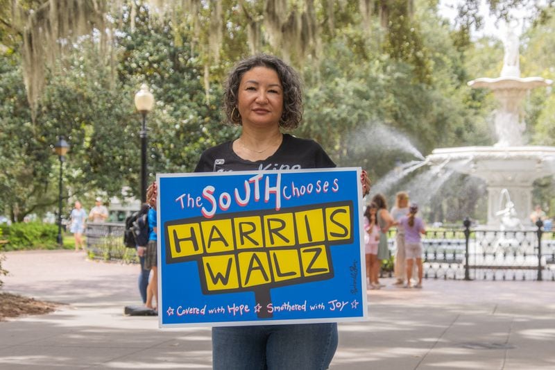 Now that Vice President Kamala Harris is the Democratic nominee for president, there's no waffling by Tabatha Strozier about who to back in November's election and what signs to choose for her yard. (AJC Photo/Katelyn Myrick)