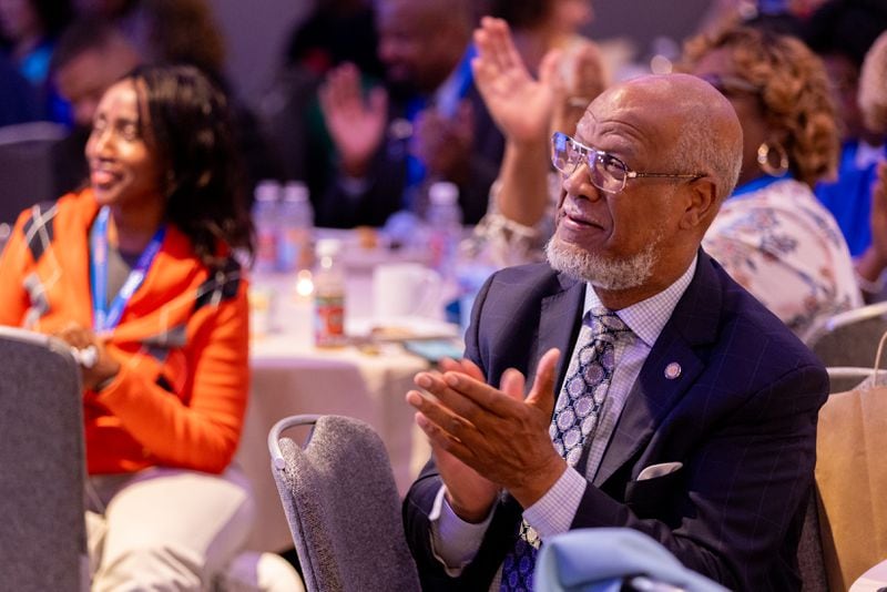 Former state representative Calvin Smyre, who has attended 12 national conventions, claps at the Georgia delegation breakfast at the Hyatt Regency in Chicago on Monday, August 19, 2024, the first day of the Democratic National Convention. (Arvin Temkar / AJC)