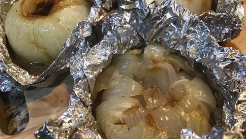 Take advantage of in-season Vidalia onions to prepare baked onions that taste like French onion soup. LIGAYA FIGUERAS / LIGAYA.FIGUERAS@AJC.COM