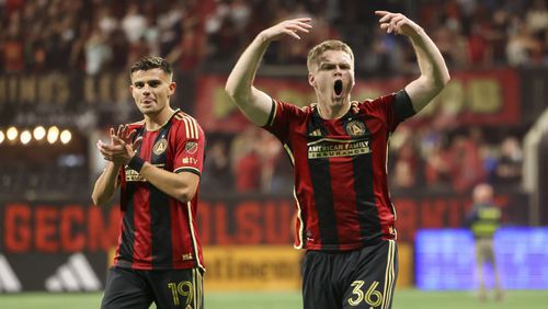 Atlanta United attackers Miguel Berry (19) and Jackson Conway (36) celebrate their 2-1 win against San Jose during their MLS season opener at Mercedes-Benz Stadium, Saturday, Feb. 25, 2023, in Atlanta. Atlanta United won 2-1. Jason Getz / Jason.Getz@ajc.com)
