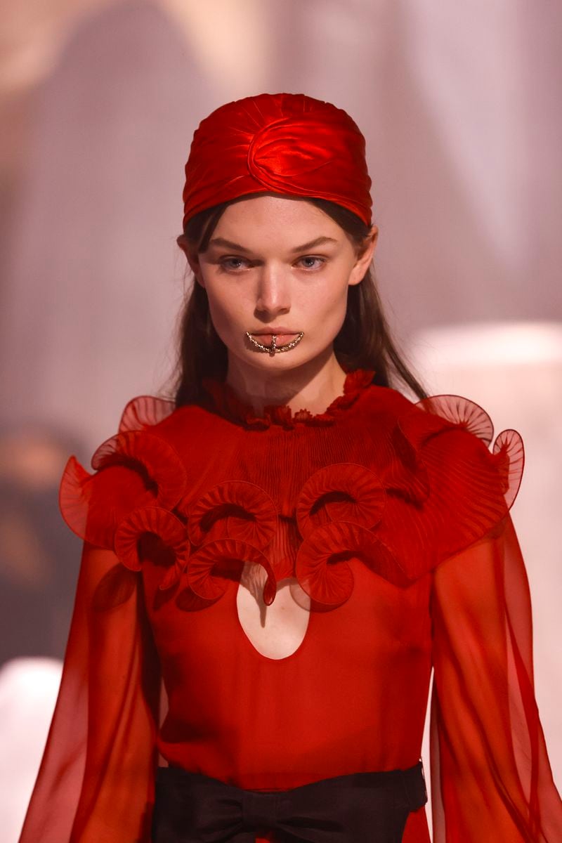 A model wears a creation as part of the Valentino Spring/Summer 2025 collection presented Sunday, Sept. 29, 2024 in Paris. (Photo by Vianney Le Caer/Invision/AP)