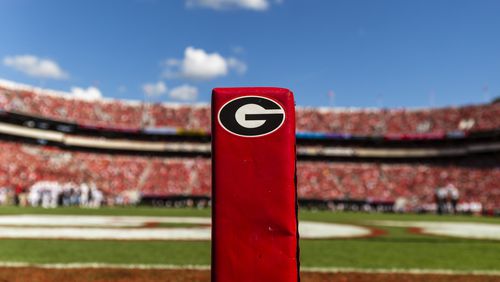 Field level view of a "Power G" branded end-zone pylon at Sanford Stadium.