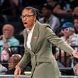 Atlanta Dream head coach Tanisha Wright reacts during the first half of a WNBA basketball first-round playoff game against the New York Liberty, Sunday, Sept. 22, 2024, in New York. (AP Photo/Corey Sipkin)