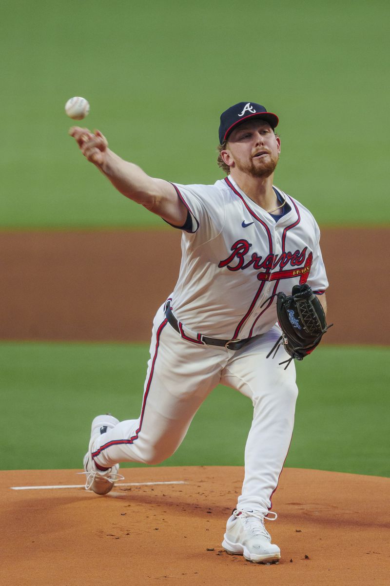 Atlanta Braves pitcher Spencer Schwellenbach throws in the first inning of a baseball game against the New York Mets, Tuesday, Sept. 24, 2024, in Atlanta. (AP Photo/Jason Allen)