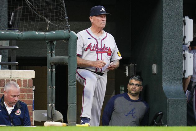 Atlanta Braves manager Brian Snitker looks on from the dugout during the sixth inning of a baseball game against the Baltimore Orioles, Tuesday, June 11, 2024, in Baltimore. (AP Photo/Jess Rapfogel)