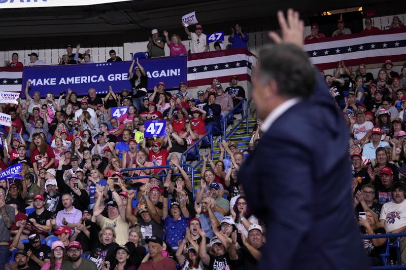 Dave McCormick, the Republican nominee for Senate in Pennsylvania, arrives to speak at a campaign rally for Republican presidential nominee former President Donald Trump at the Mohegan Sun Arena at Casey Plaza in Wilkes-Barre, Pa., Saturday, Aug. 17, 2024. (AP Photo/Carolyn Kaster)