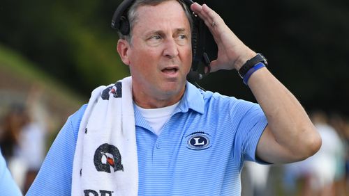 Lovett coach Mike Muschamp works the sideline during a game against Marist. (John Amis/Special)