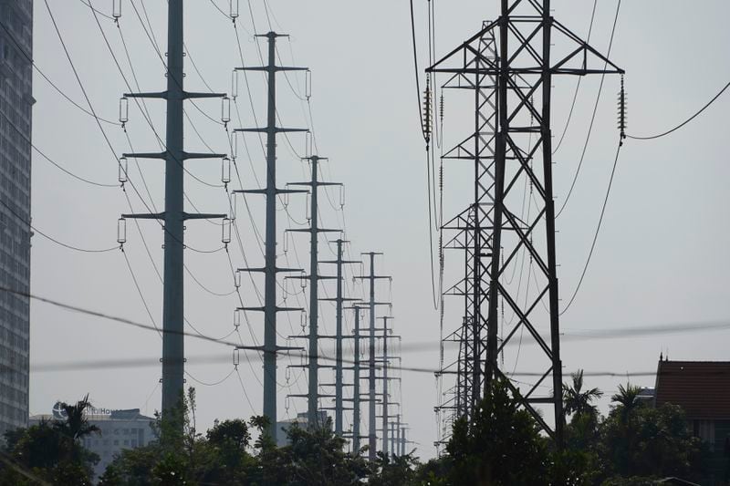 FILE- This photo shows power lines in Hanoi, Vietnam, on June 8, 2023. (AP Photo/Hau Dinh, File)