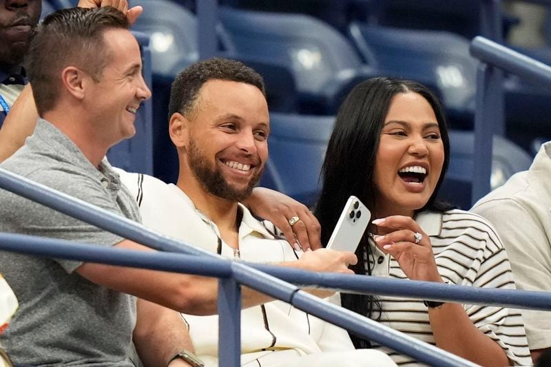 Speth Curry and his wife arrive for the women's singles final of the U.S. Open tennis championships between Aryna Sabalenka, of Belarus, and Jessica Pegula, of the United States, Saturday, Sept. 7, 2024, in New York. (AP Photo/Frank Franklin II)