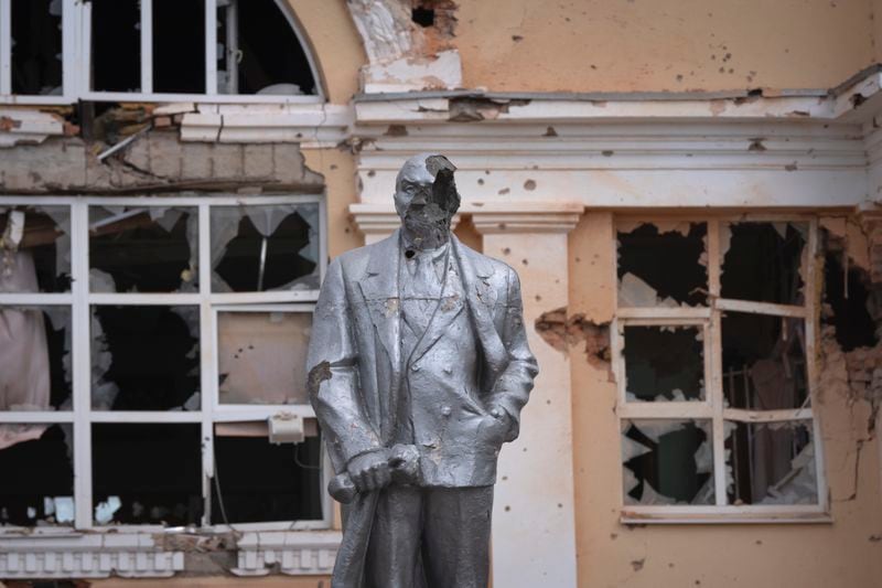 FILE - A damaged monument to Soviet founder Vladimir Lenin stands in a central square in the Kursk region town Sudzha, Russia, on Aug. 16, 2024. This image was approved by the Ukrainian Defense Ministry before publication. (AP Photo, File)