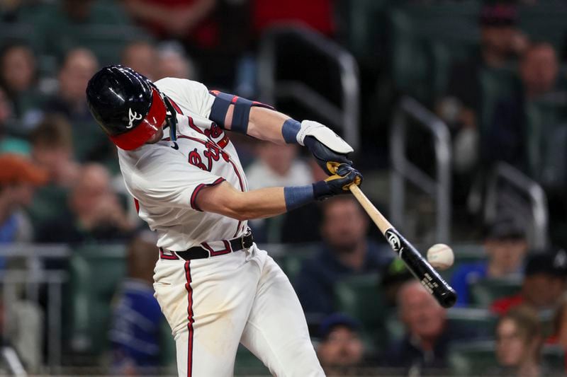 Atlanta Braves third baseman Zack Short (59) hits a RBI double during the sixth inning against the Chicago Cubs at Truist Park, Monday, May 13, 2024, in Atlanta. (Jason Getz / AJC)
