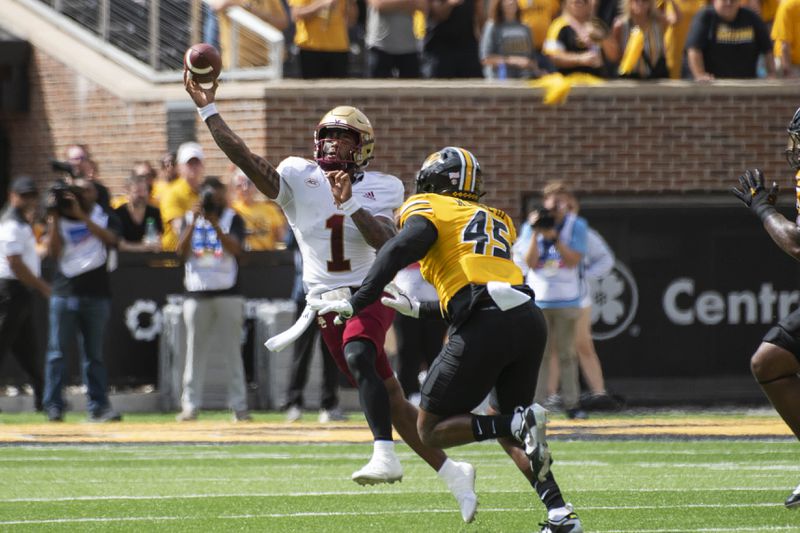 Boston College quarterback Thomas Castellanos (1) throws a pass over Missouri defensive end Joe Moore (45) during the first half of an NCAA college football game Saturday, Sept. 14, 2024, in Columbia, Mo. (AP Photo/L.G. Patterson)