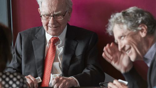 FILE - Warren Buffett, Chairman and CEO of Berkshire Hathaway, left, plays bridge with Bill Gates, following the annual Berkshire Hathaway shareholders meeting on May 5, 2019 in Omaha, Neb. (AP Photo/Nati Harnik, File)