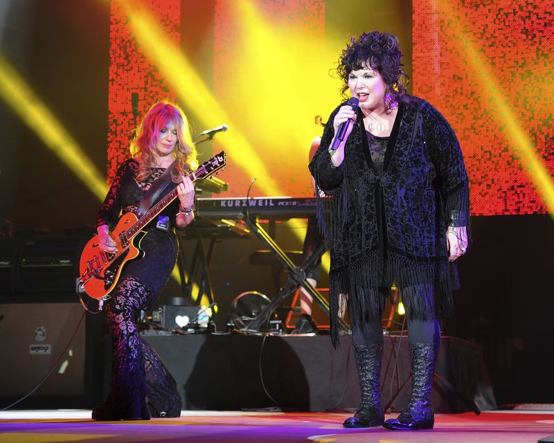 FILE - Nancy Wilson, left, and Ann Wilson of Heart perform on opening night of the Heartbreaker Tour at the Cruzan Amphitheater in West Palm Beach, Fla., June 17, 2013. (Photo by Jeff Daly/Invision/AP, File)