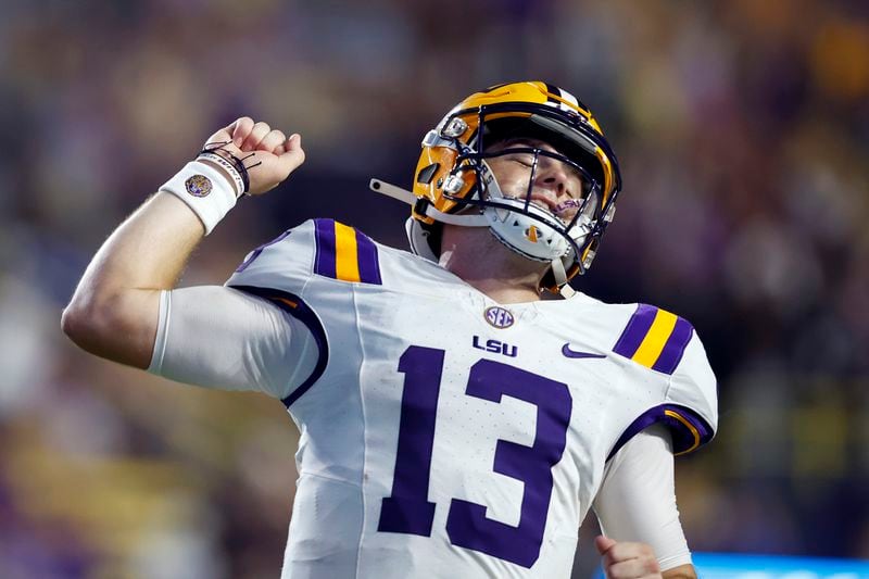 LSU quarterback Garrett Nussmeier (13) reacts after throwing a touchdown pass during the second half of an NCAA college football game against Nicholls State in Baton Rouge, La., Saturday, Sept. 7, 2024. (AP Photo/Tyler Kaufman)