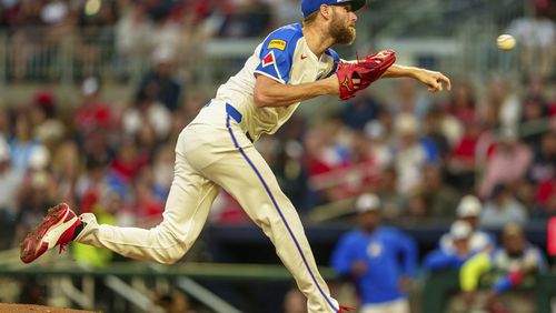 Atlanta Braves pitcher Chris Sale throws in the first inning of a baseball game against the Los Angeles Dodgers, Saturday, Sept. 14, 2024, in Atlanta. (AP Photo/Jason Allen)