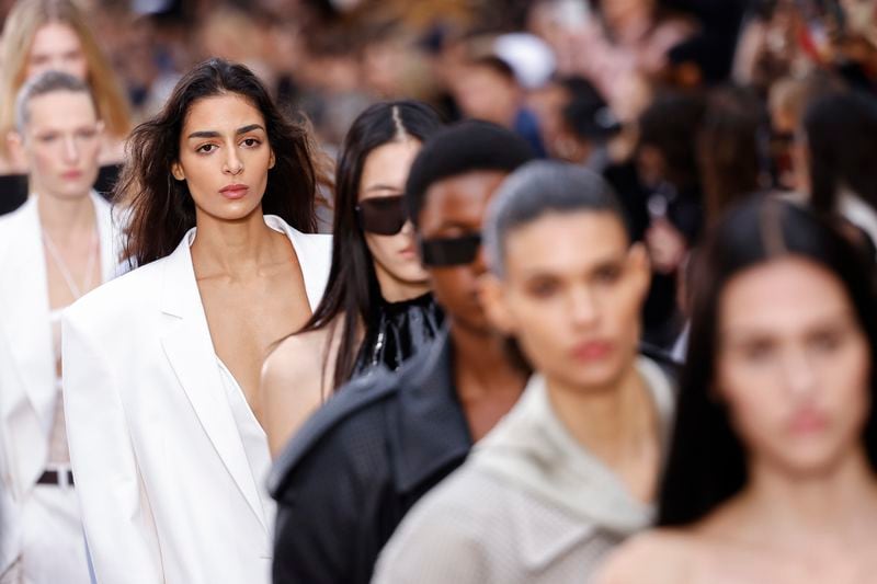 Models wear creations as part of the Stella McCartney Spring/Summer 2025 collection presented Monday, Sept. 30, 2024 in Paris. (Photo by Vianney Le Caer/Invision/AP)