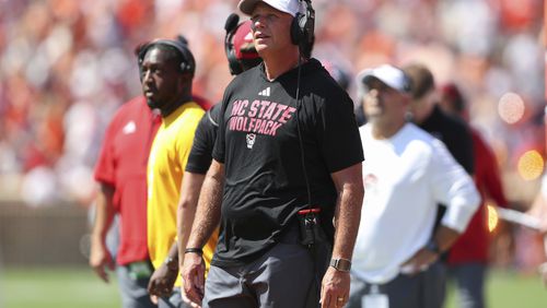 North Carolina State head coach Dave Doeren watches an instant replay on the scoreboard during the first half of an NCAA college football game against Clemson Saturday, Sept. 21, 2024, in Clemson, S.C. (AP Photo/Artie Walker Jr.)