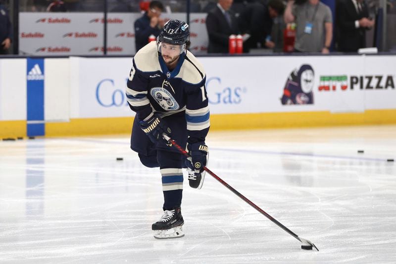 FILE - Columbus Blue Jackets forward Johnny Gaudreau warms up before an NHL hockey game against the Pittsburgh Penguins in Columbus, Ohio, Saturday, March 30, 2024. (AP Photo/Paul Vernon, File)