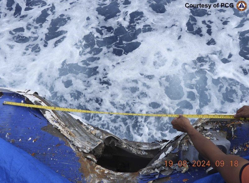 This photo provided by the Philippine Coast Guard, shows damage on the Philippines coast guard vessel BRP Cape Engano (MRRV-4411) after a collision with a Chinese coast guard ship Monday, Aug. 19, 2024 in the disputed South China Sea. (Philippine Coast Guard via AP)