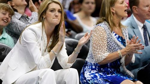 110605 Atlanta - The newly expanded Dream ownership group now includes Kelly Loeffler, left,  and Mary Brock, right, cheering their team in 2nd half action against New York at Philips Arena in Atlanta on Sunday, June 5, 2011.   Curtis Compton  ccompton@ajc.com