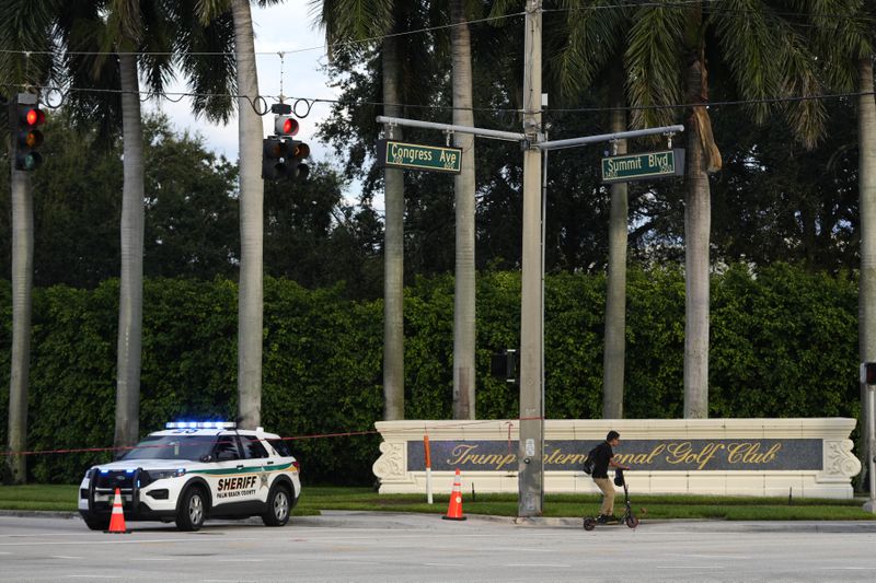 A vehicle with the Palm Beach County Sheriff's office is parked outside of Trump International Golf Club after the apparent assassination attempt of Republican presidential nominee and former President Donald Trump, Monday, Sept. 16, 2024, in West Palm Beach, Fla. (AP Photo/Lynne Sladky)