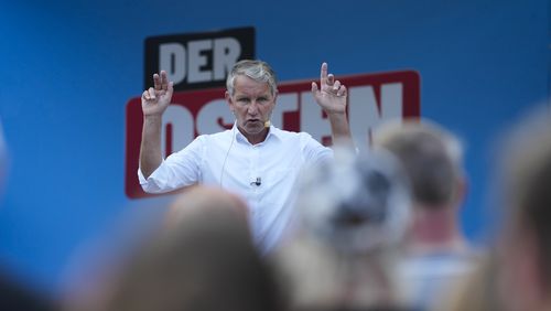 Bjoern Hoecke, top candidate of the far-right Alternative for Germany party, or AfD, speaks on an election campaign rally of the party for upcoming state elections in Suhl, Germany, Tuesday, Aug. 13, 2024. In the federal state Thuringia, in former East Germany, the citizens are called to vote for a new state parliament on Sept. 1, 2024. (AP Photo/Markus Schreiber)