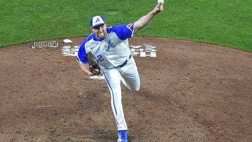 Atlanta Braves relief pitcher Dylan Lee (52) delivers against the San Diego Padres in the sixth inning Saturday, April 8, 2023 at Truist Park in Atlanta. (Daniel Varnado / For the AJC)