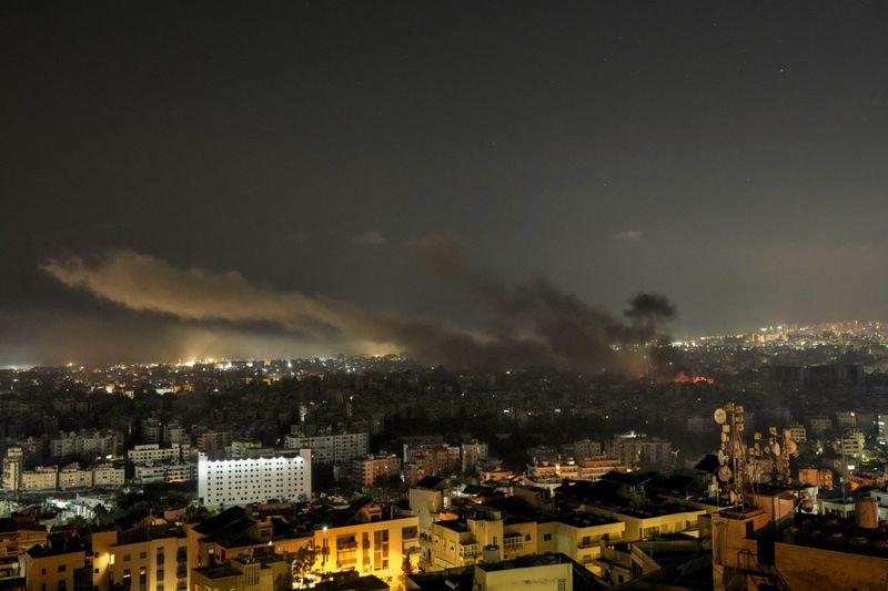 Smoke rises after Israeli airstrikes in Dahiyeh, Beirut, Lebanon, Saturday, Oct. 5, 2024. (AP Photo/Bilal Hussein)