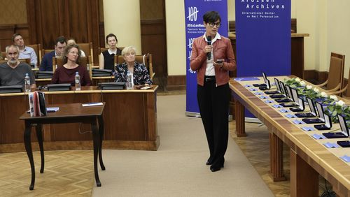 The director of Germany's Arolsen Archives, Floriane Azoulay, talks to the relatives of 12 inmates of World War II Nazi Germany's concentration camps at the start of a ceremony in which the relatives were given back personal items and jewellery that the Nazis had seized from them during the war and which were recently stored at the archives, in Warsaw, Poland, Tuesday Sept. 10, 2024. (AP Photo/Czarek Sokolowski)