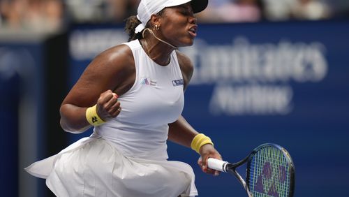 Taylor Townsend, of the United States, reacts after scoring a point against Paula Badosa, of Spain, during the first round of the U.S. Open tennis championships, Wednesday, Aug. 28, 2024, in New York. (AP Photo/Julia Nikhinson)