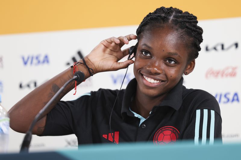 FILE - Colombia's forward Linda Caicedo speaks during a news conference at the Sydney Football Stadium in Sydney, Australia, Monday, July 24, 2023. Crowded schedules and the big stage are nothing new to Caicedo, a cancer survivor who was a breakout star at the senior Women's World Cup last summer. (AP Photo/Jessica Gratigny)