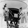 FILE - This photo provided by NASA shows the "Sounds of Earth" record being mounted on the Voyager 2 spacecraft in the Safe-1 Building at the Kennedy Space Center, Fla. Aug. 4, 1977. (AP Photo/NASA, File)