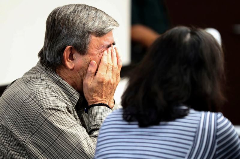 Antonios Pagourtzis, left, reacts as he and his wife, Rose Marie Kosmetatos, listen as Galveston County Court Judge Jack Ewing reads the jury's verdict Monday, Aug. 19, 2024, at the Galveston County Courthouse in Galveston, Texas. (Jennifer Reynolds/The Galveston County Daily News via AP, Pool)