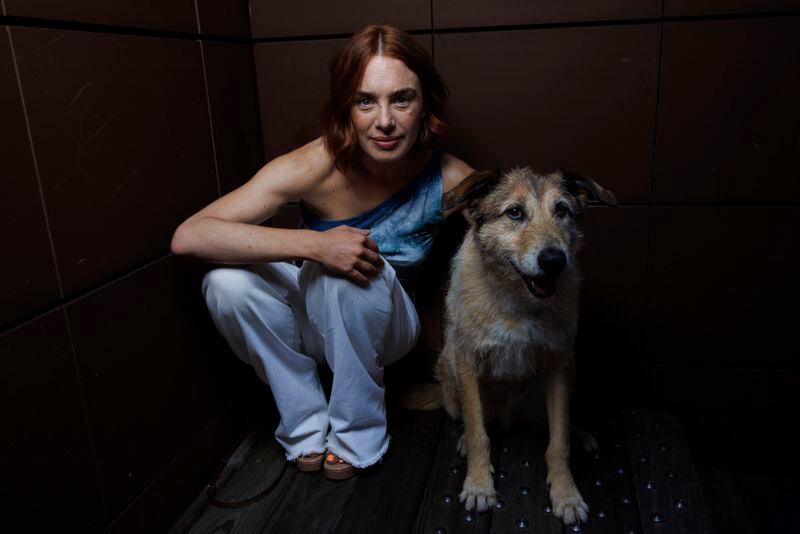 Director Laetitia Dosch and Cosmos pose for portrait photographs for the film 'Dog on Trial' at the 77th international film festival, Cannes, southern France, Saturday, May 18, 2024. (Photo by Vianney Le Caer/Invision/AP)