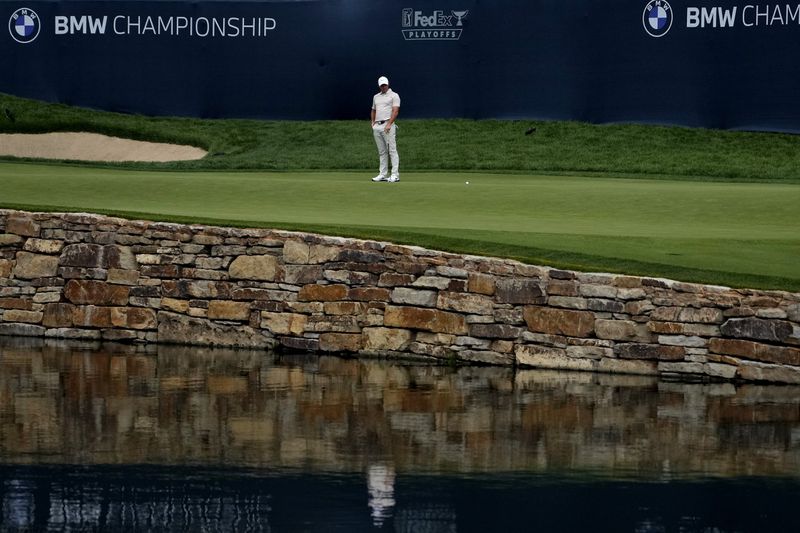 Rory McIlroy, of Northern Ireland, misses his shot on the 16th green during the first round of the BMW Championship golf event at Castle Pines Golf Club, Thursday, Aug. 22, 2024, in Castle Rock, Colo. (AP Photo/Matt York)