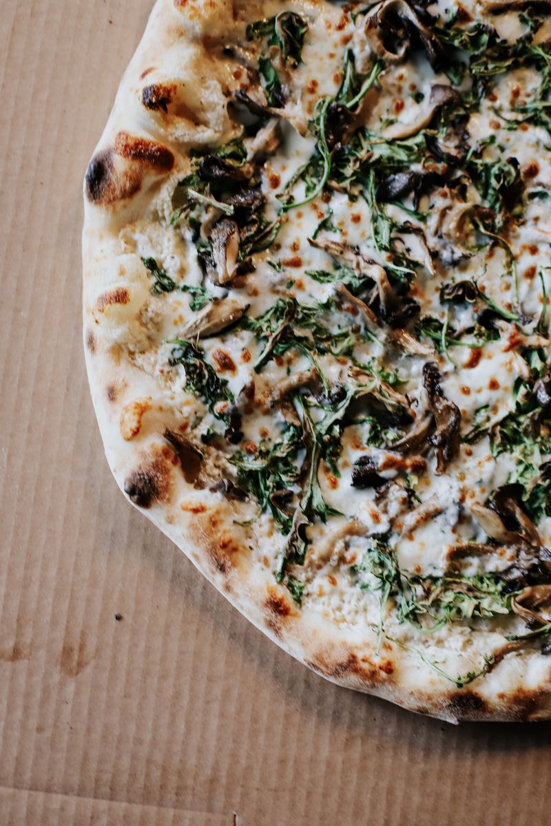 The Bianca Shroom pizza from Micah Angelo's Pizza in Marietta features mushroom and mozzarella cheese.  / Photo courtesy of Alex Roberts