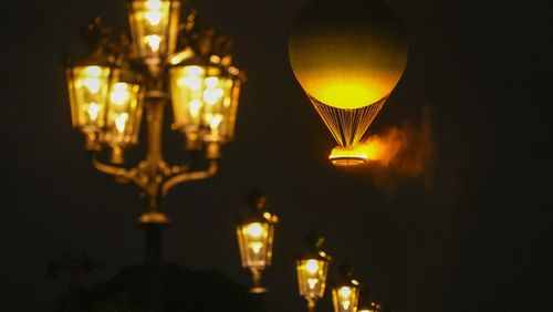 The Olympic Flame rises on a balloon after being lit in Paris, France, during the opening ceremony of the 2024 Summer Olympics, Friday, July 26, 2024. (AP Photo/Francisco Seco)