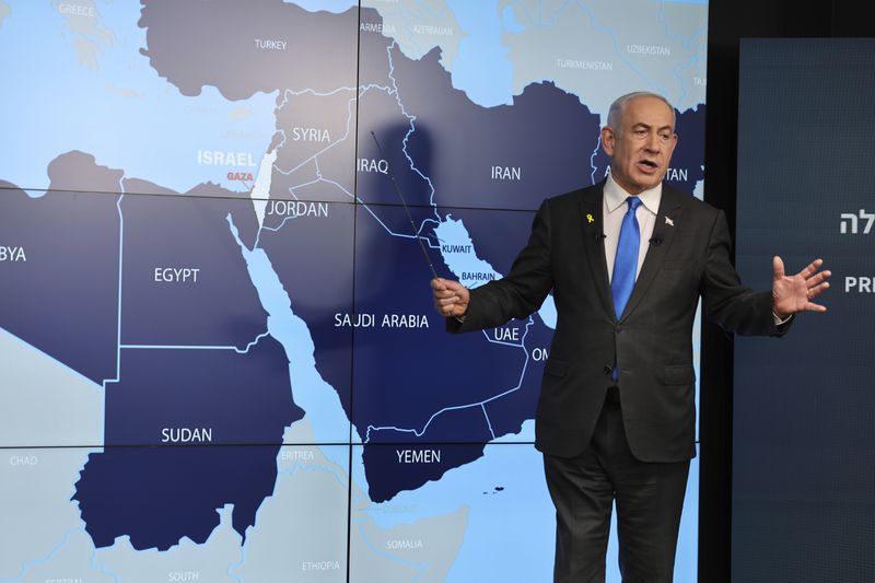 Israeli Prime Minister Benjamin Netanyahu stands before a map during a press conference at the Government Press office in Jerusalem, Wednesday, Sept. 4, 2024. (Abir Sultan/Pool via AP)