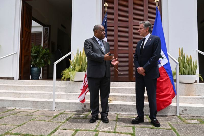 Haitian Prime Minister Garry Conille, left, and U.S. Secretary of State Antony Blinken speak to the press at the U.S. Chief of Mission Residence in Port-au-Prince, Haiti, Thursday, Sept. 5, 2024. (Roberto Schmidt/Pool photo via AP)