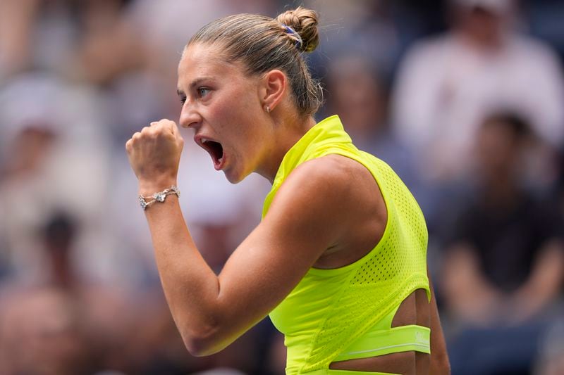 Marta Kostyuk, of Ukraine, reacts after scoring a point against Emma Navarro, of the United States, Marta Kostyuk, of Ukraine, during the third round of the U.S. Open tennis championships, Friday, Aug. 30, 2024, in New York. (AP Photo/Matt Rourke)