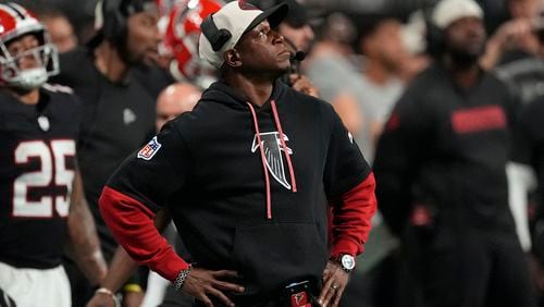 Atlanta Falcons head coach Raheem Morris reacts during the second half of an NFL football game against the Tampa Bay Buccaneers Thursday, Oct. 3, 2024, in Atlanta. (AP Photo/John Bazemore)